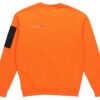 Avslappnad lös rund halsad pullover med låg orange färg