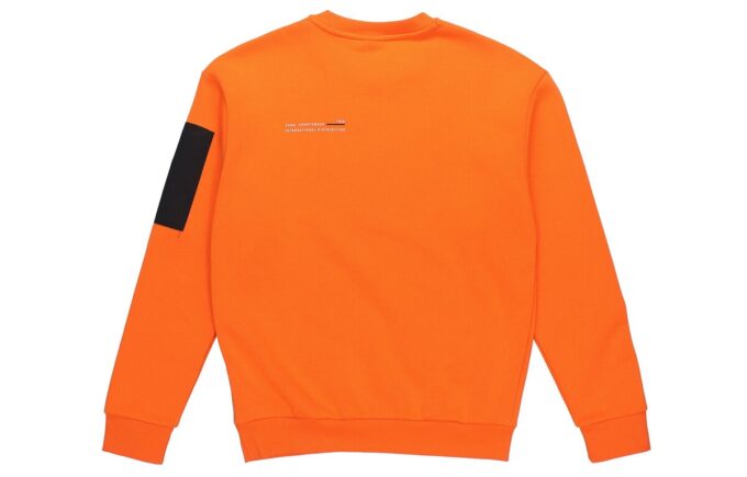 Avslappnad lös rund halsad pullover med låg orange färg