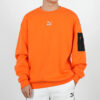 Avslappnad lös rund halsad pullover med låg orange färg