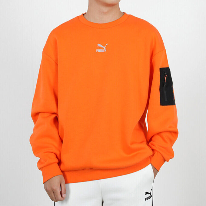 Avslappnad lös rund halsad pullover med låg orange färg