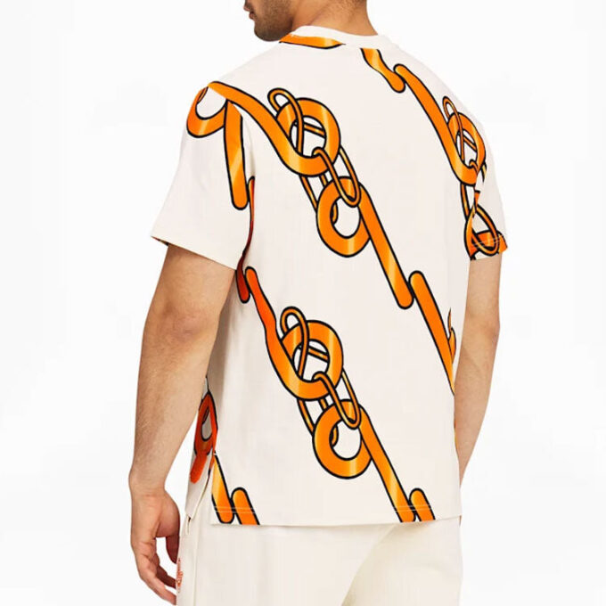 PUMA x PRONOUNCE Unisex T-shirt med grafisk design, korsad kedjetryck, Athleisure, casual, sport, kortärmad, krämig vit