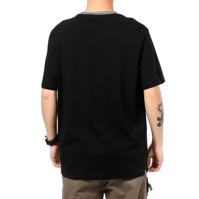 T-shirt med ficka i svart och vit