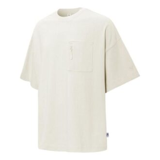 T-shirt med logotypficka ”Beige”